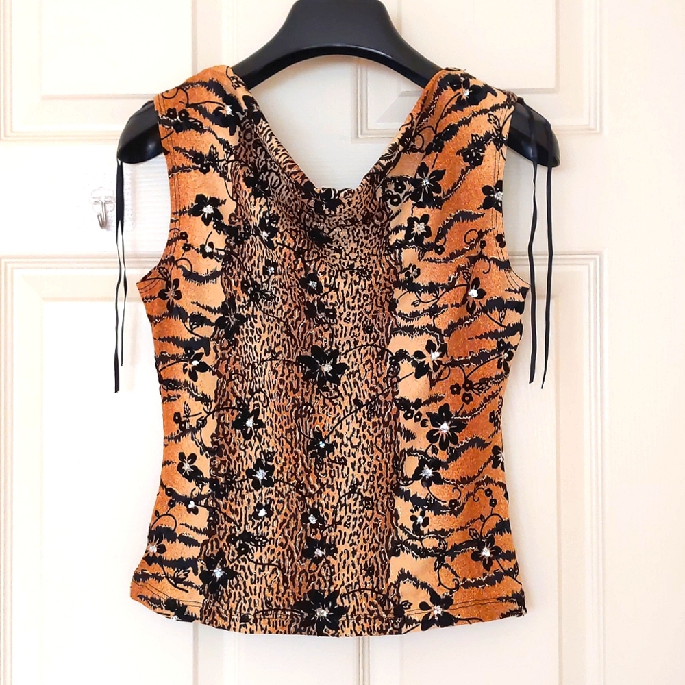 NWOT. Multi color sleeveless top with velour flowers & hand decorated sparkling